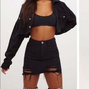 Black distressed denim skirt